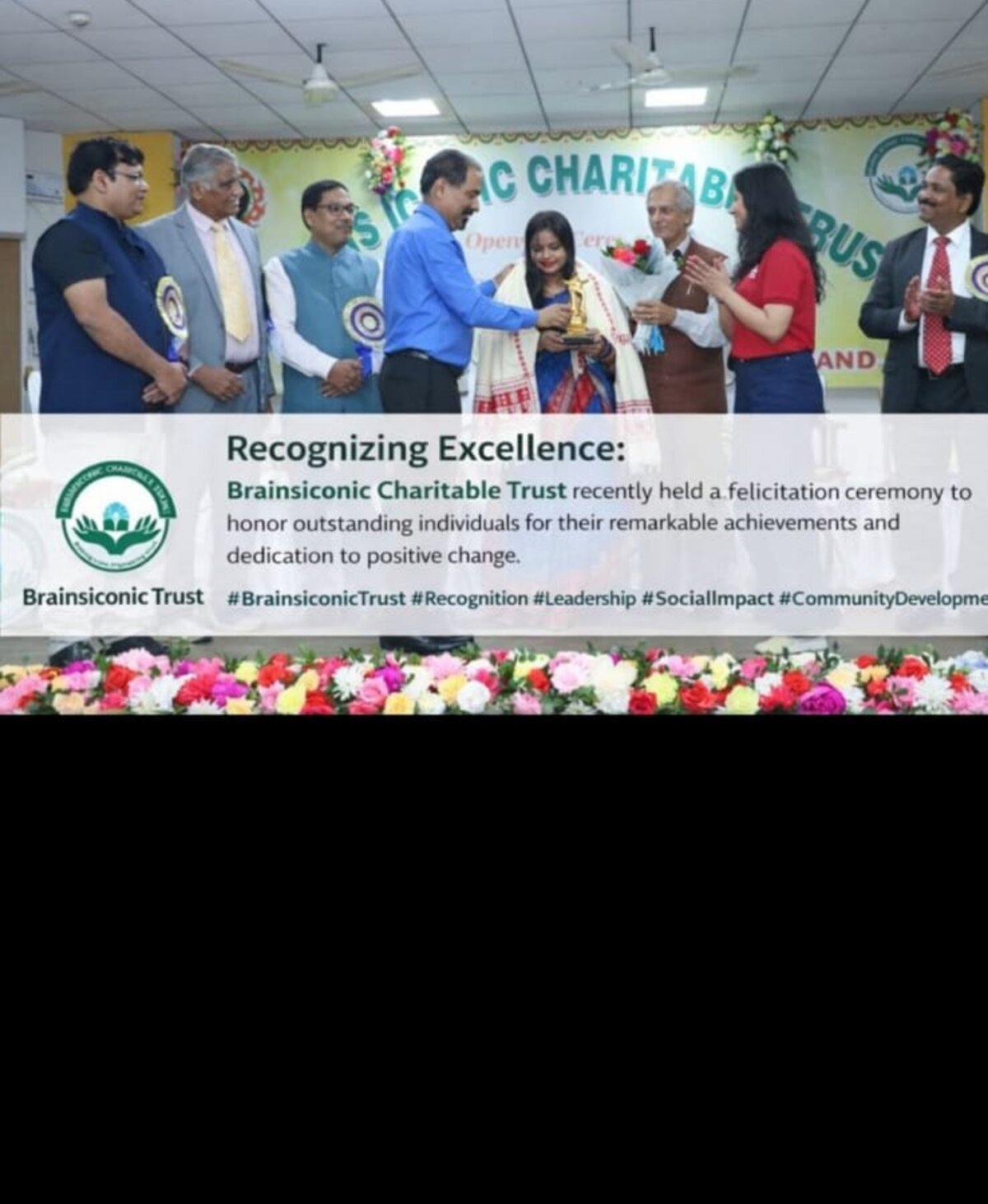 Felicitation ceremony recognizing individuals for their contributions, held by Brains Iconic Charitable Trust.