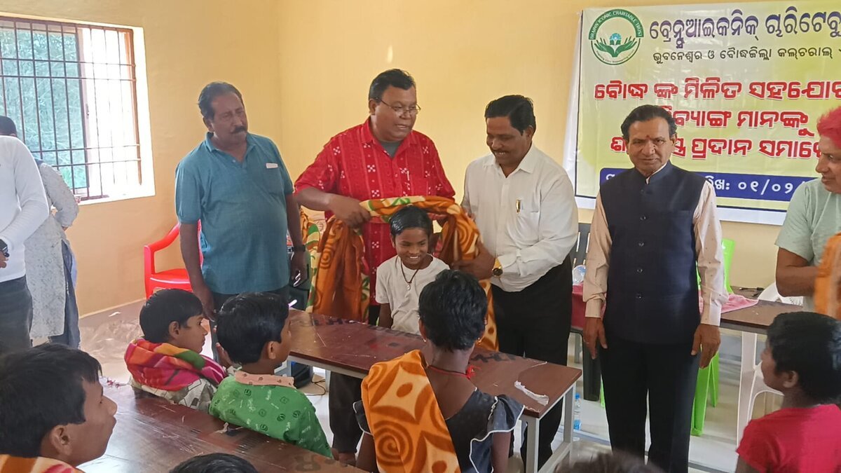 Children and community members at a Brains Iconic Charitable Trust distribution event.